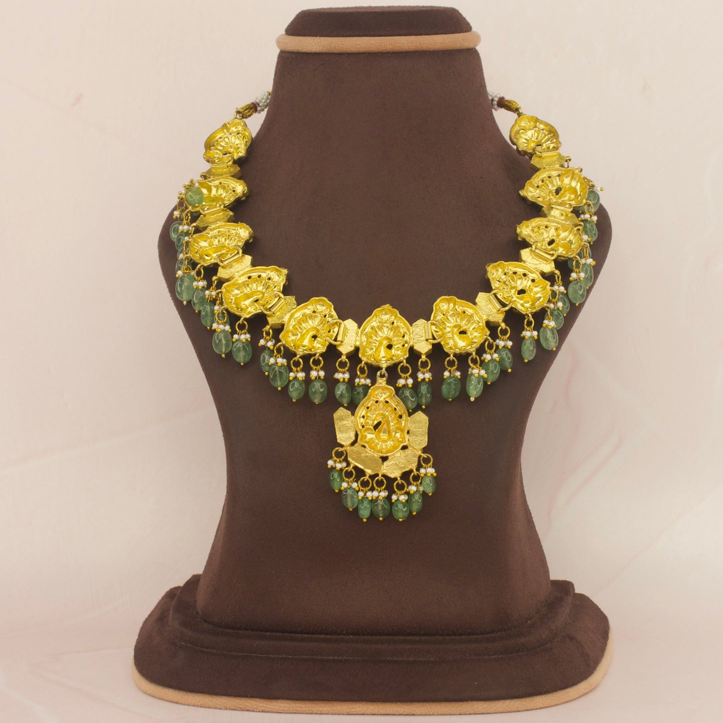 Peacock Splendor: Jadau Kundan Necklace with Green Bead with 22k Gold plating . This piece comes under Jadau Kundan jewellery 