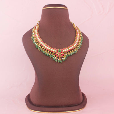 Sleek Jadau Kundan Necklace With Strawberry Beads