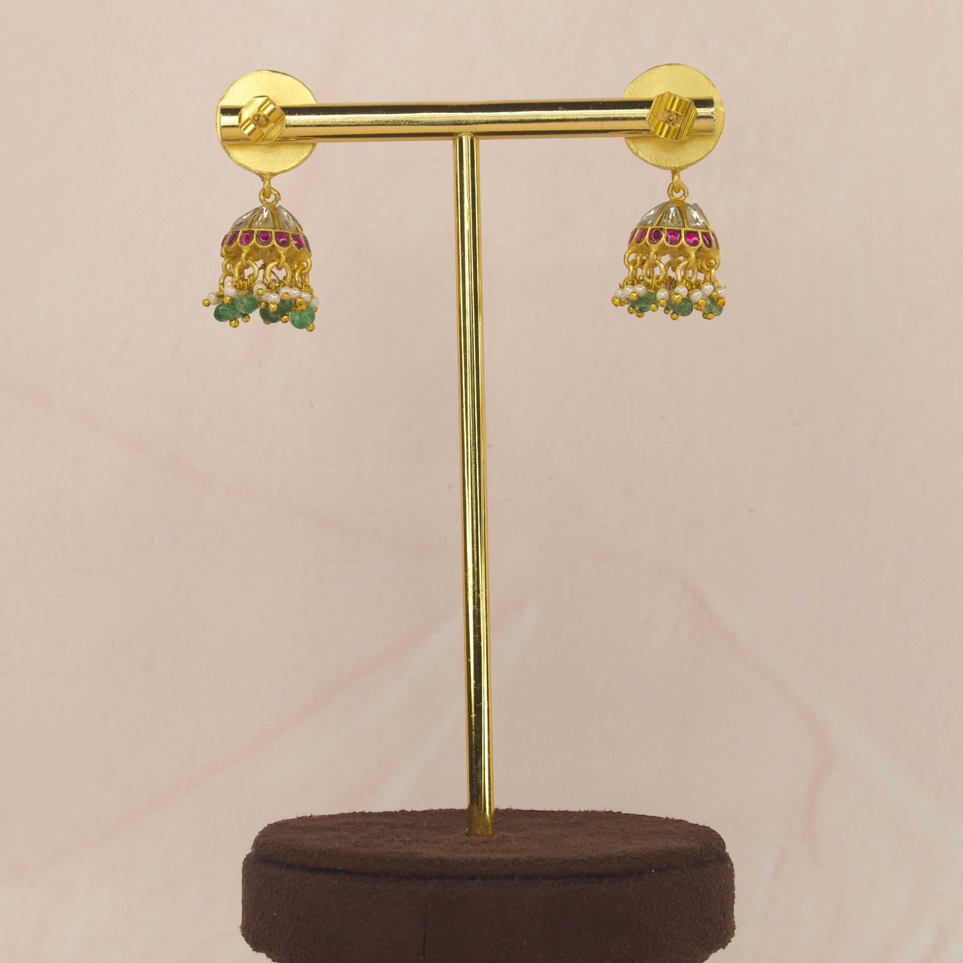 Multi colour jadau kundan jhumka with 22k gold plating. thus product belongs to jadau kundan jewellery category