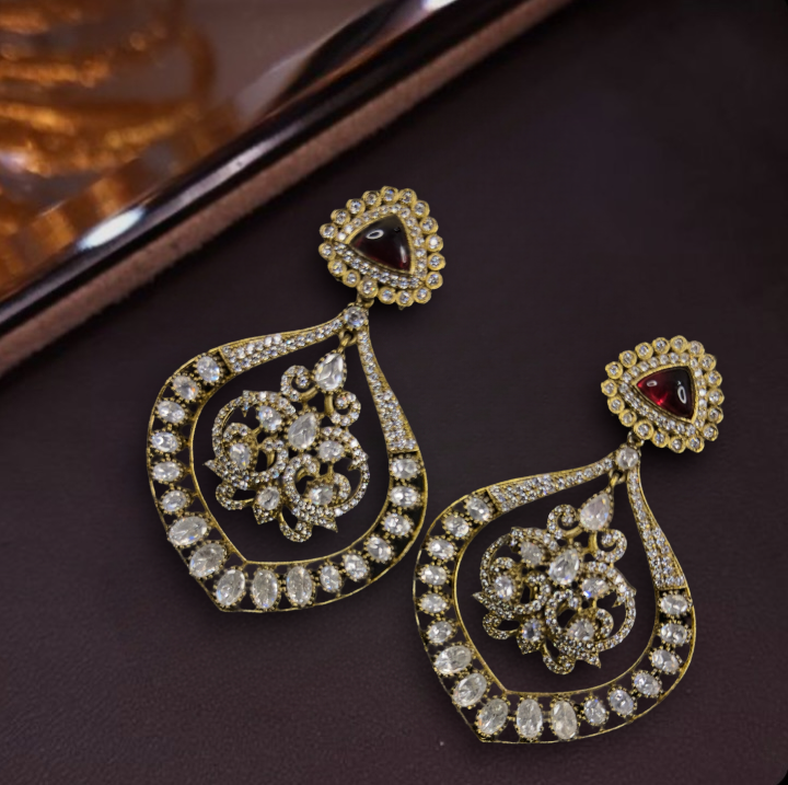 Contemporary Victorian Moissanite Earrings. This Victorian Jewellery is available in a Red colour variant. 