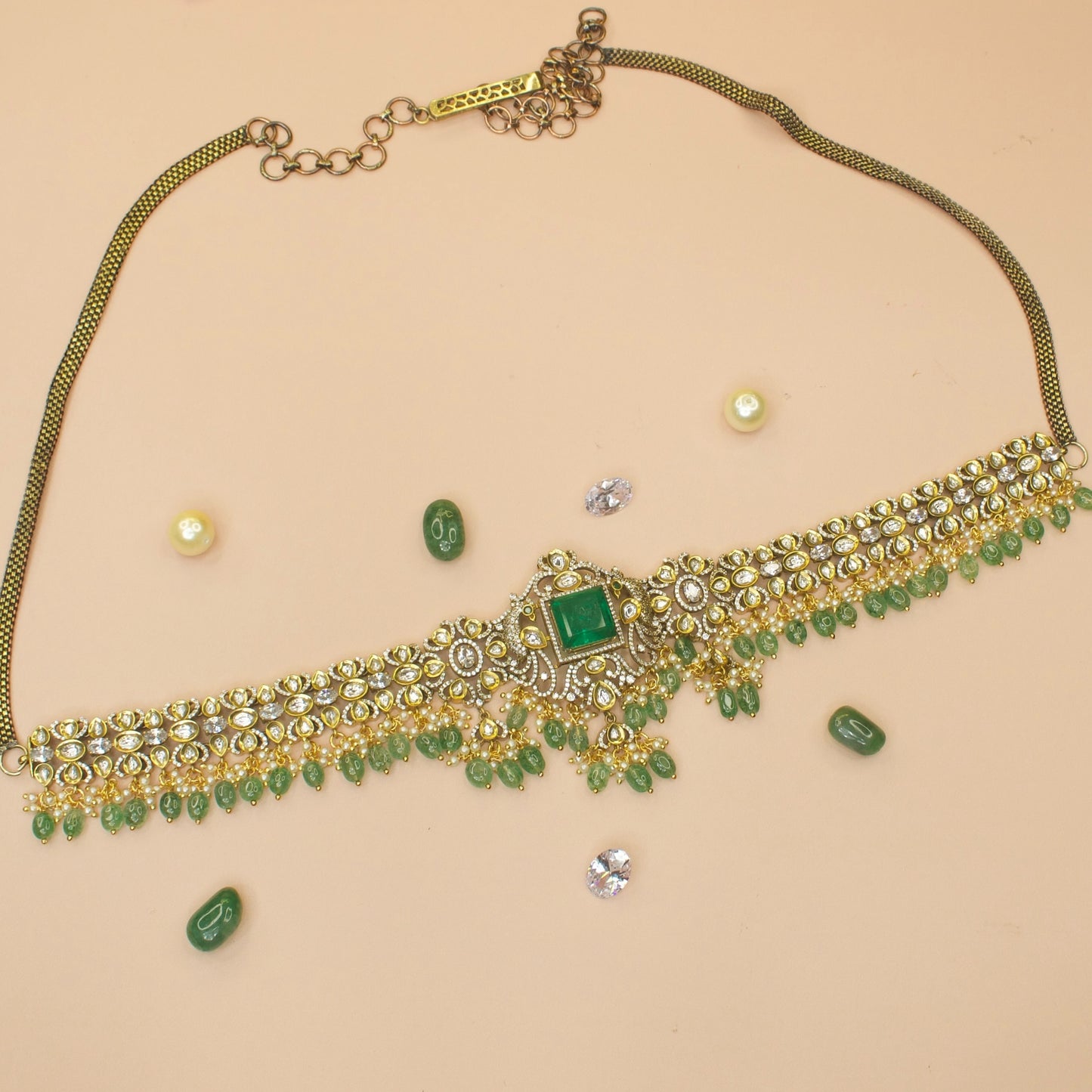 Adorable Victorian Hip Chain, also known as Vaddanam/Waist chain, with zircon, polki, emerald, pearls, and beads. Available in a lustrous green colour variant.