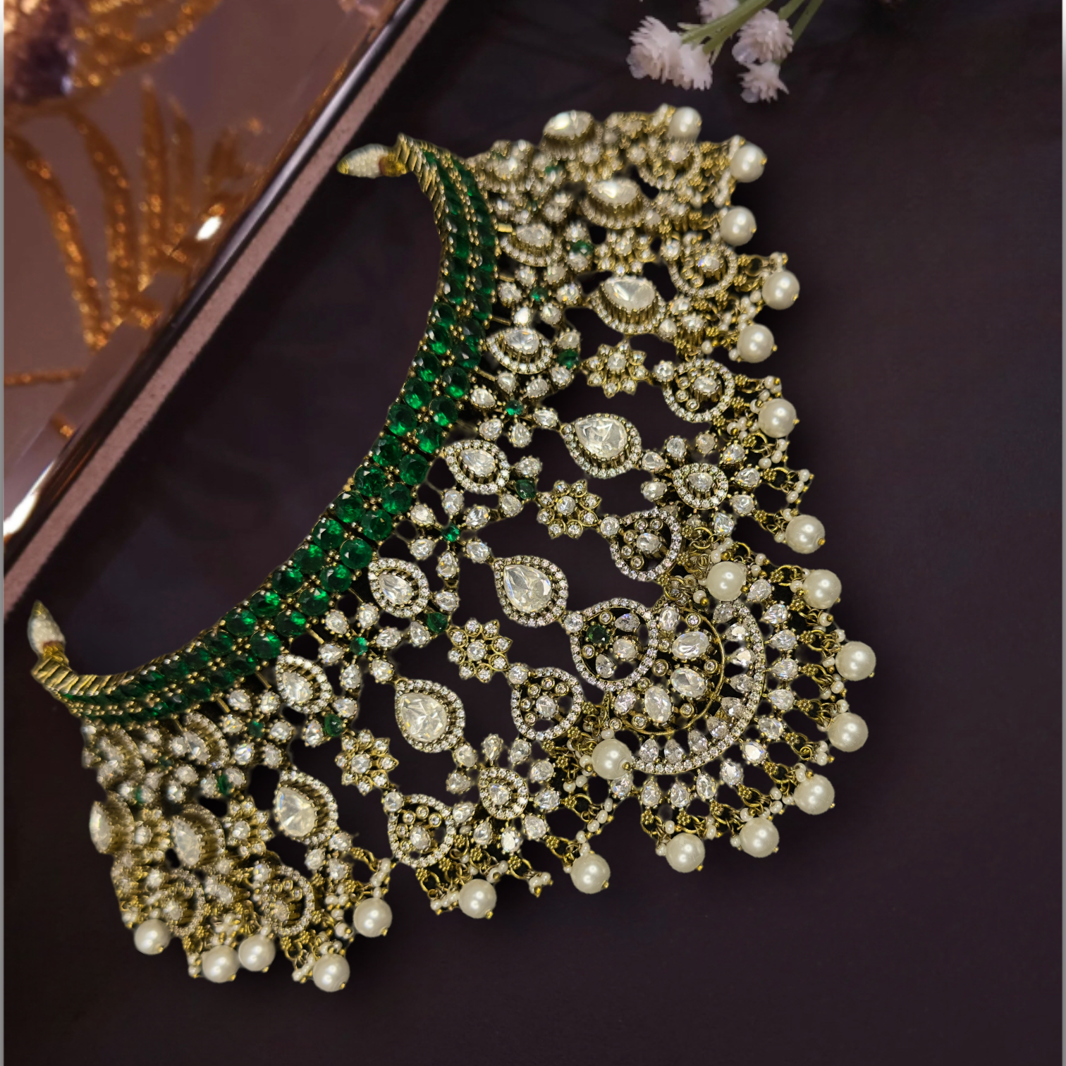 Designer Moissanite Victorian Choker Set with Maang tikka, zircon, moissanite polki stones, pearls, and beads, including matching earrings. This Victorian Jewellery is available in Red & Green colour variants. 
