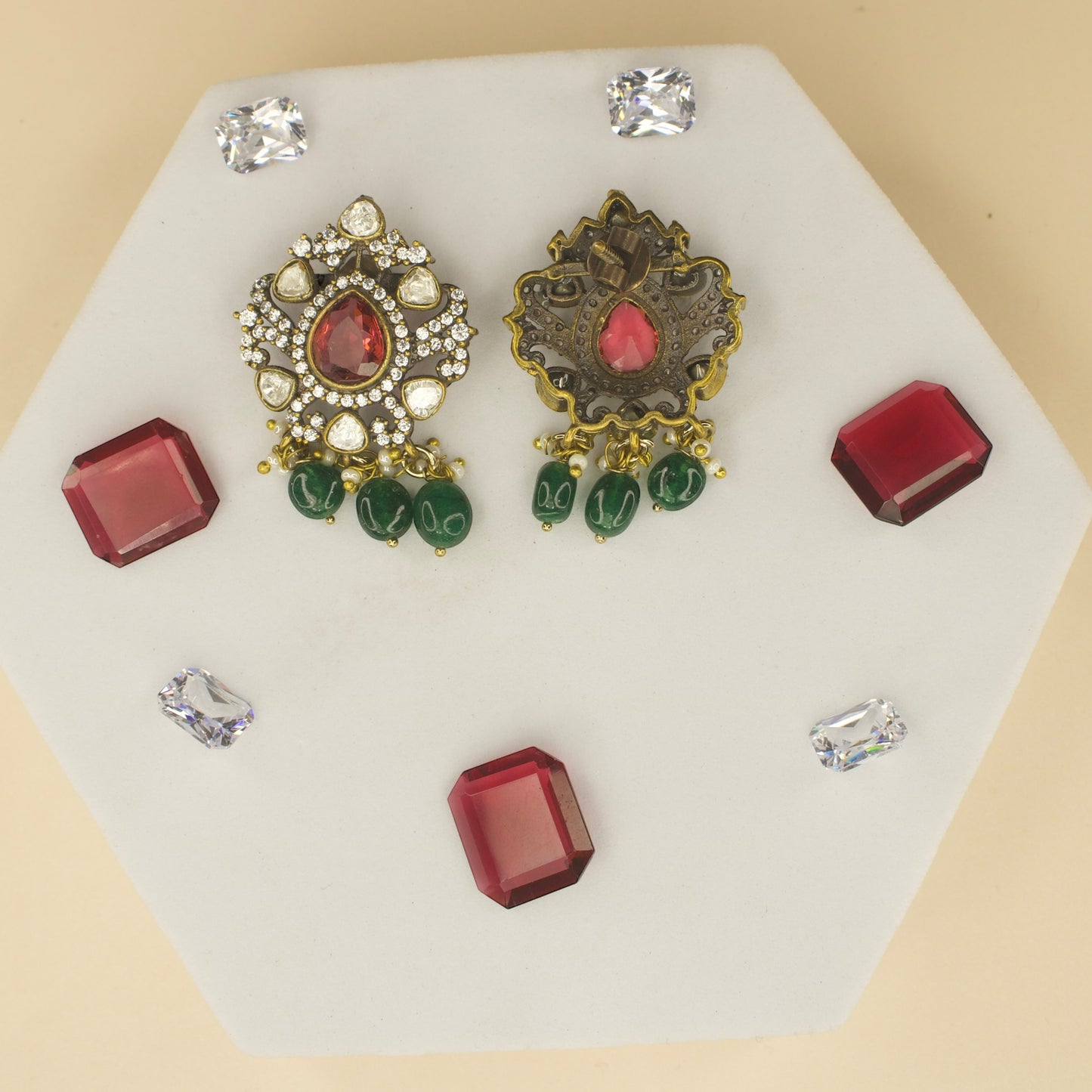 Polki studded Victorian plated studs with high quality victorian finish. available in ruby and green