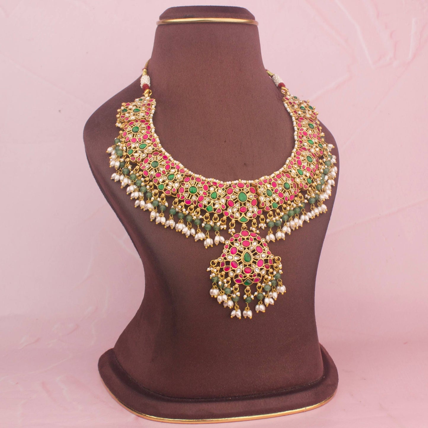 Close-Up Detail View of Classic Kundan Necklace With Ruby Accents And Pearl Tassels | Dulhan Jewels