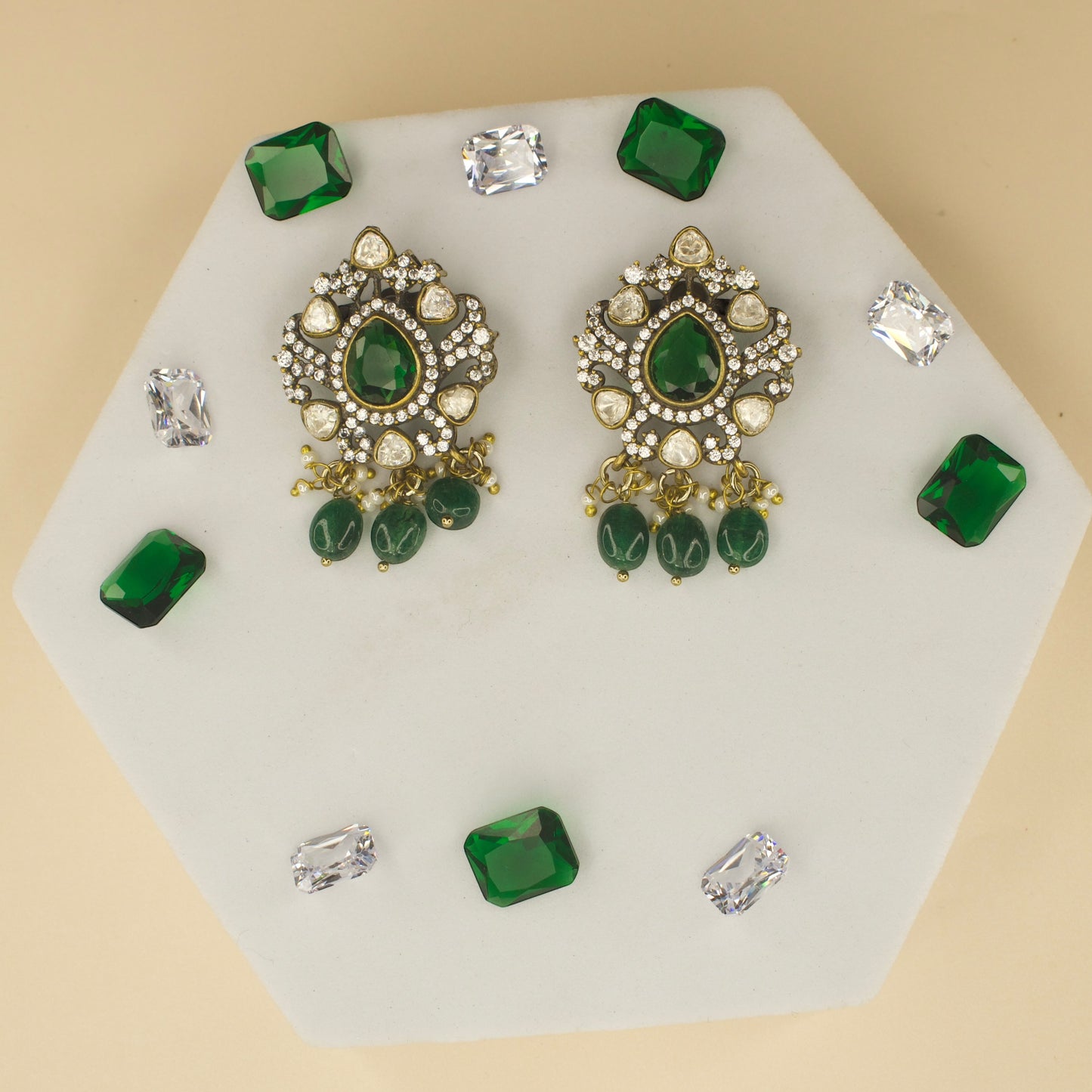 Polki studded Victorian plated studs with high quality victorian finish. available in ruby and green