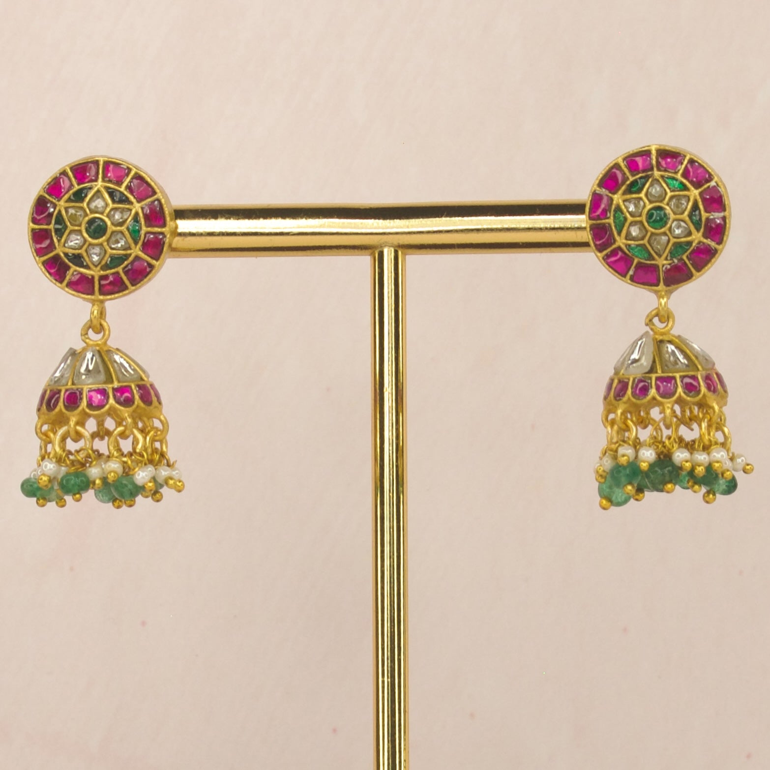 Multi colour jadau kundan jhumka with 22k gold plating. thus product belongs to jadau kundan jewellery category