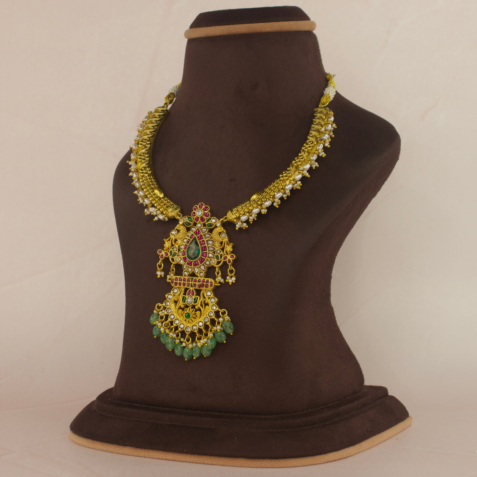 Regal Jadau Kundan Kanti Necklace with Pearl  Detailing with 22k gold plating. this product belongs to jadau kundan jewellery category