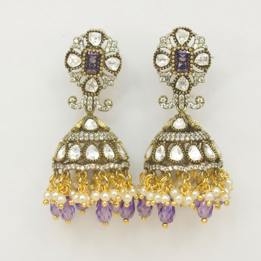 Robust Polki Victorian Jhumka with zircon stones. This Victorian Jewellery is available in Red,Green & Purple colour variants. 