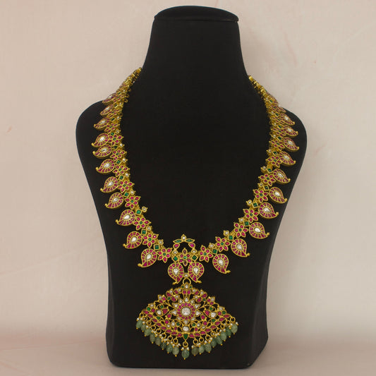 Traditional Real Gold Look Jadau Kundan Mango Necklace with 22k Gold plating . This product belongs to jadau Kundan jewellery category