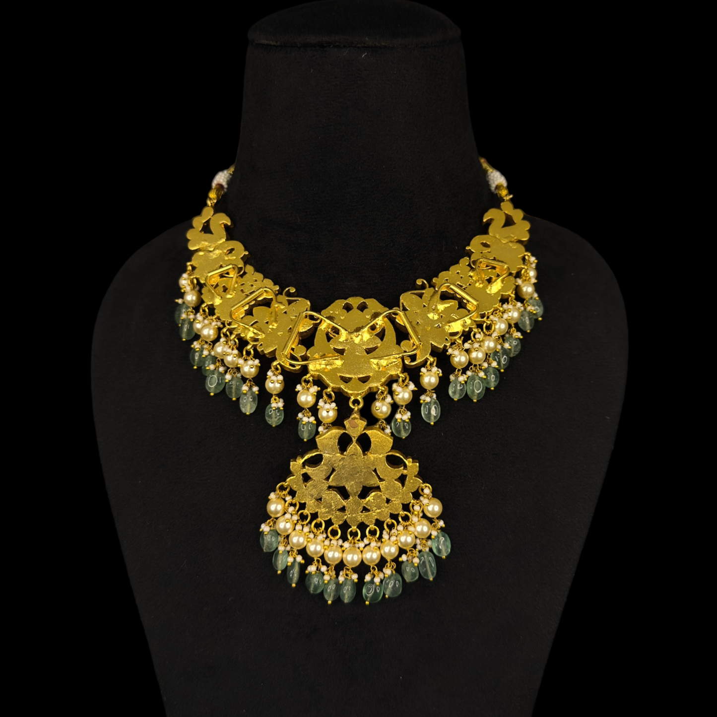 Regal Jadau Kundan Necklace with Ornate Pendants with 22k gold plating This product belongs to Jadau Kundan jewellery Category