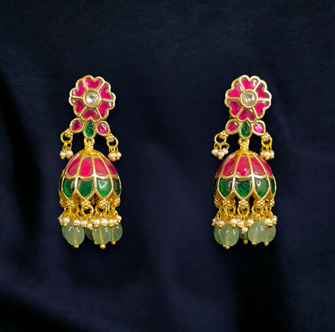 Vibrant Floral Jadau Kundan Jhumkas with Green Beads with 22k gold plating. these products belong to jadau kundan jewellery category