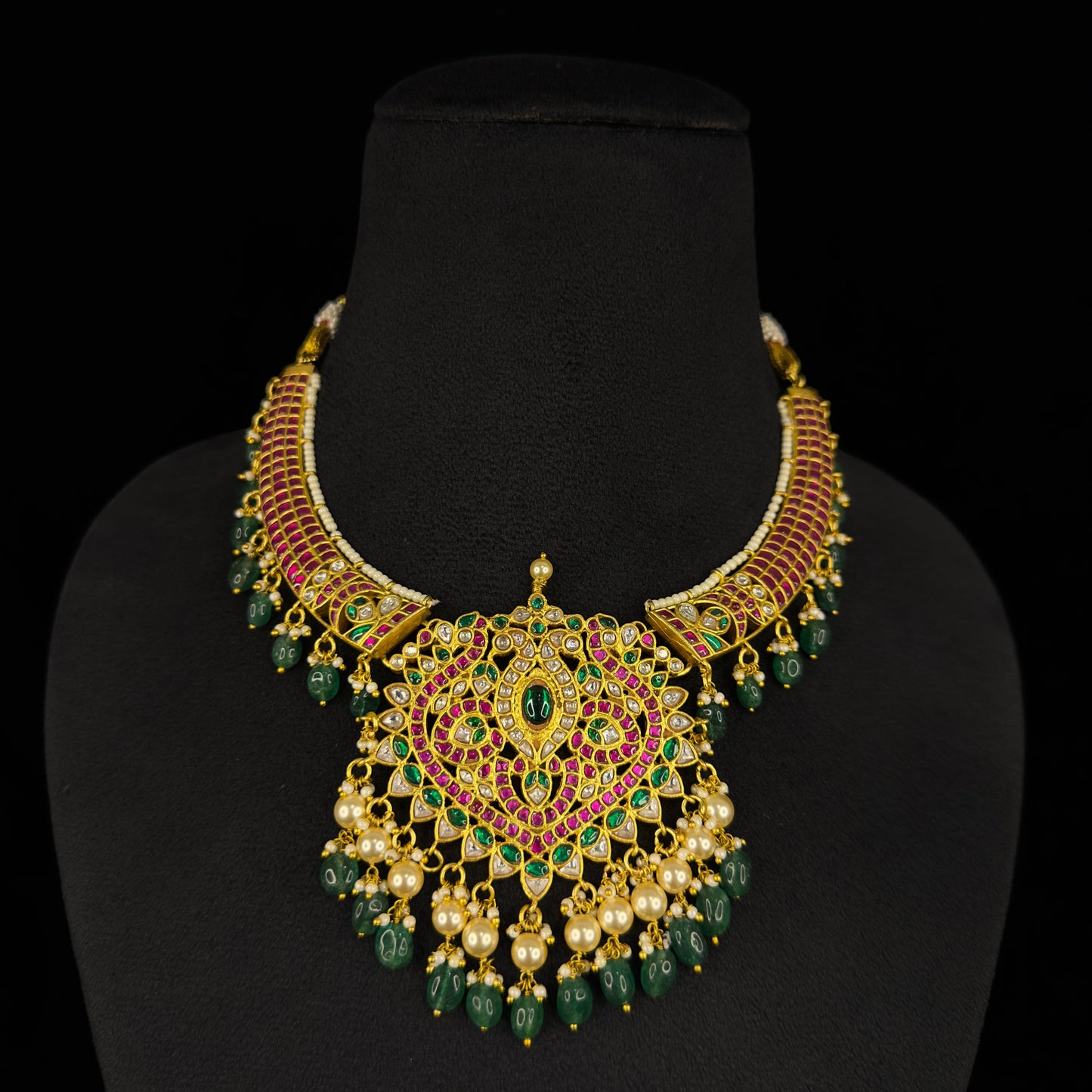 Radiant Jadau Kundan Kanti Necklace with Pearls and Beads with 22k Gold Plating This product belongs to jadau kundan jewellery category