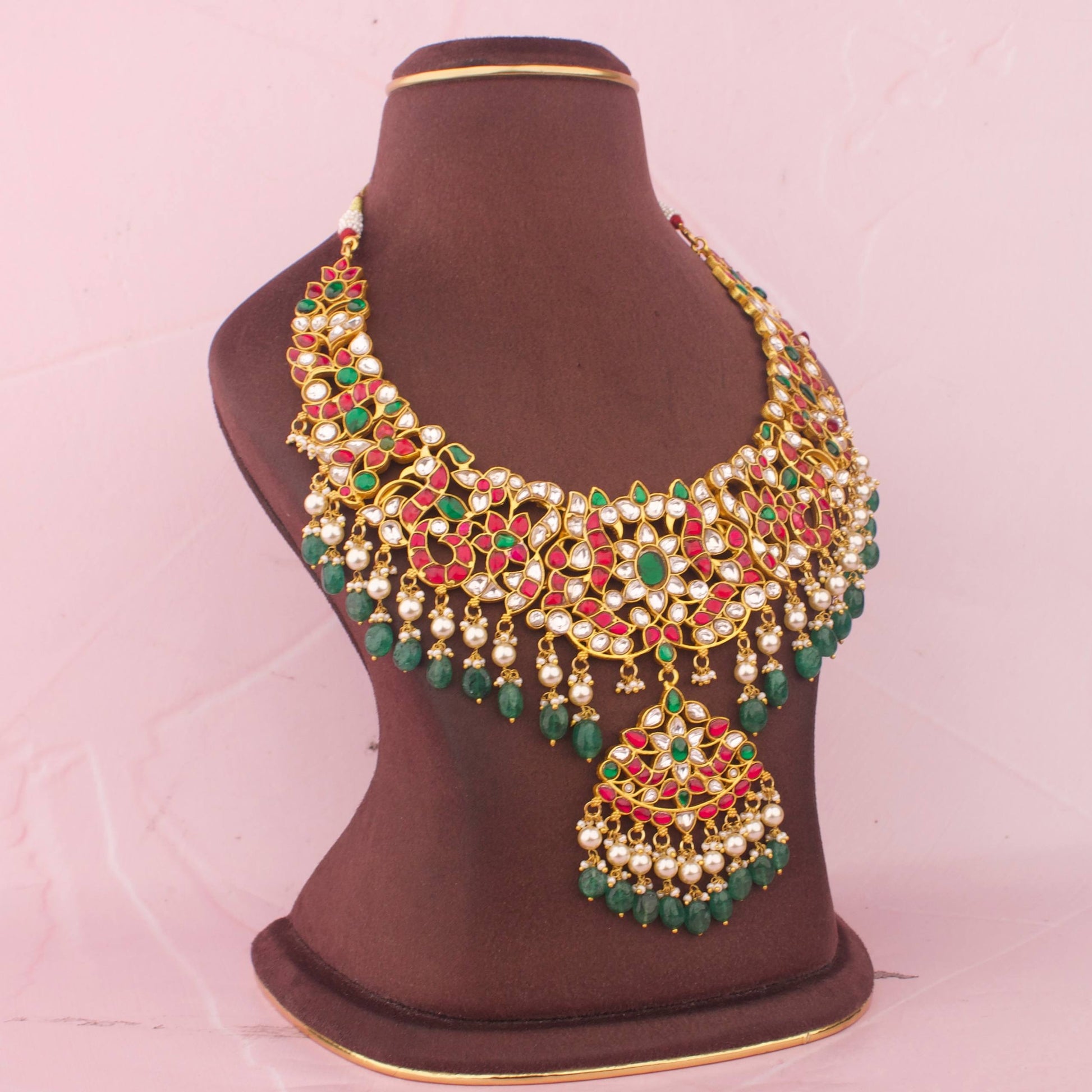 Side view of premium Traditional Jadau Kundan Necklace With Green Bead Hangings imitation jewellery