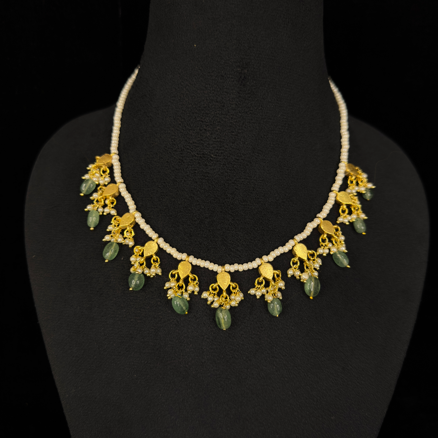 Graceful Jadau Kundan Pearl Necklace Set with Green Beads with 22k gold plating. this product belongs to jadau kundan jewellery category