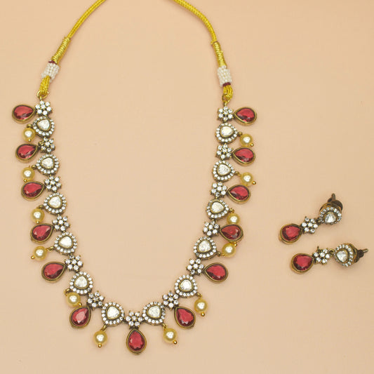 Simple Victorian Necklace set with pearls and screw-back earrings. Available in red, green, and purple colour variants.