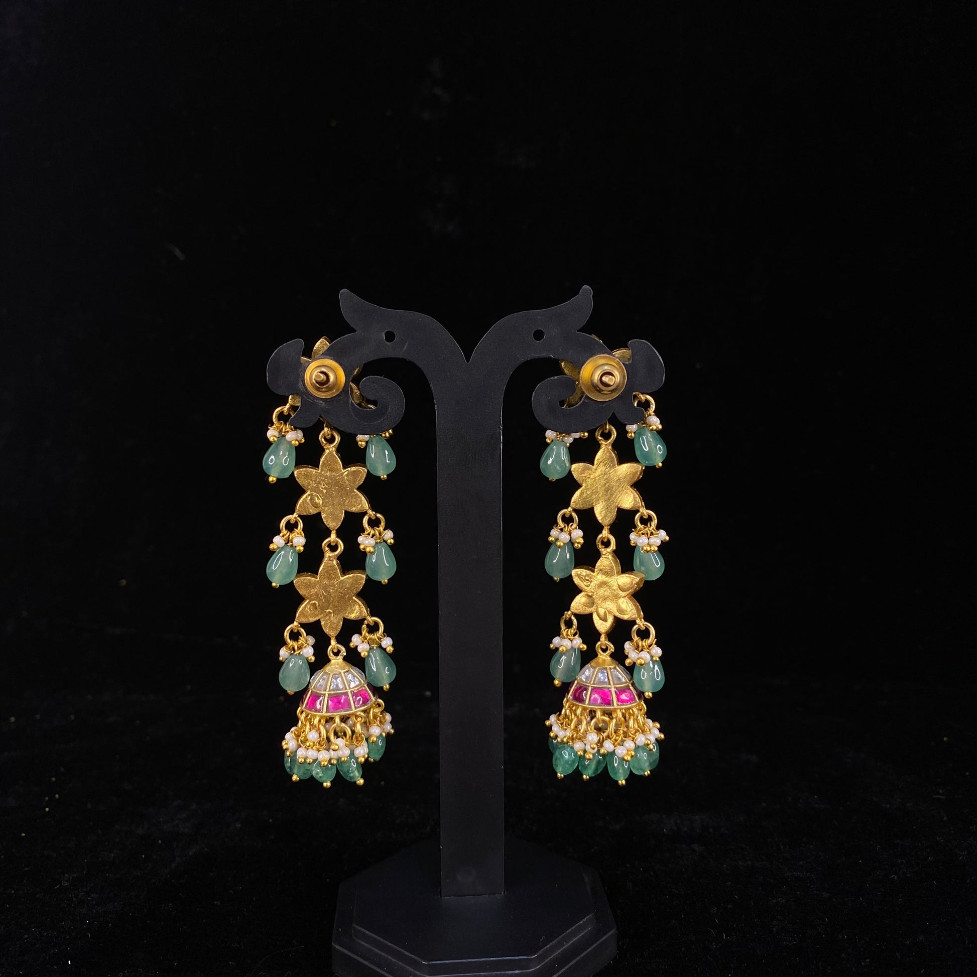 Cascading Floral Elegance Jadau Kundan Jhumkas with 22k gold plating. This product belongs to jadau kundan jewellery category