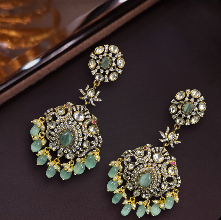 Victorian Zircon Earrings in mint colour with zircons, kundan polki, & onyx beads.
