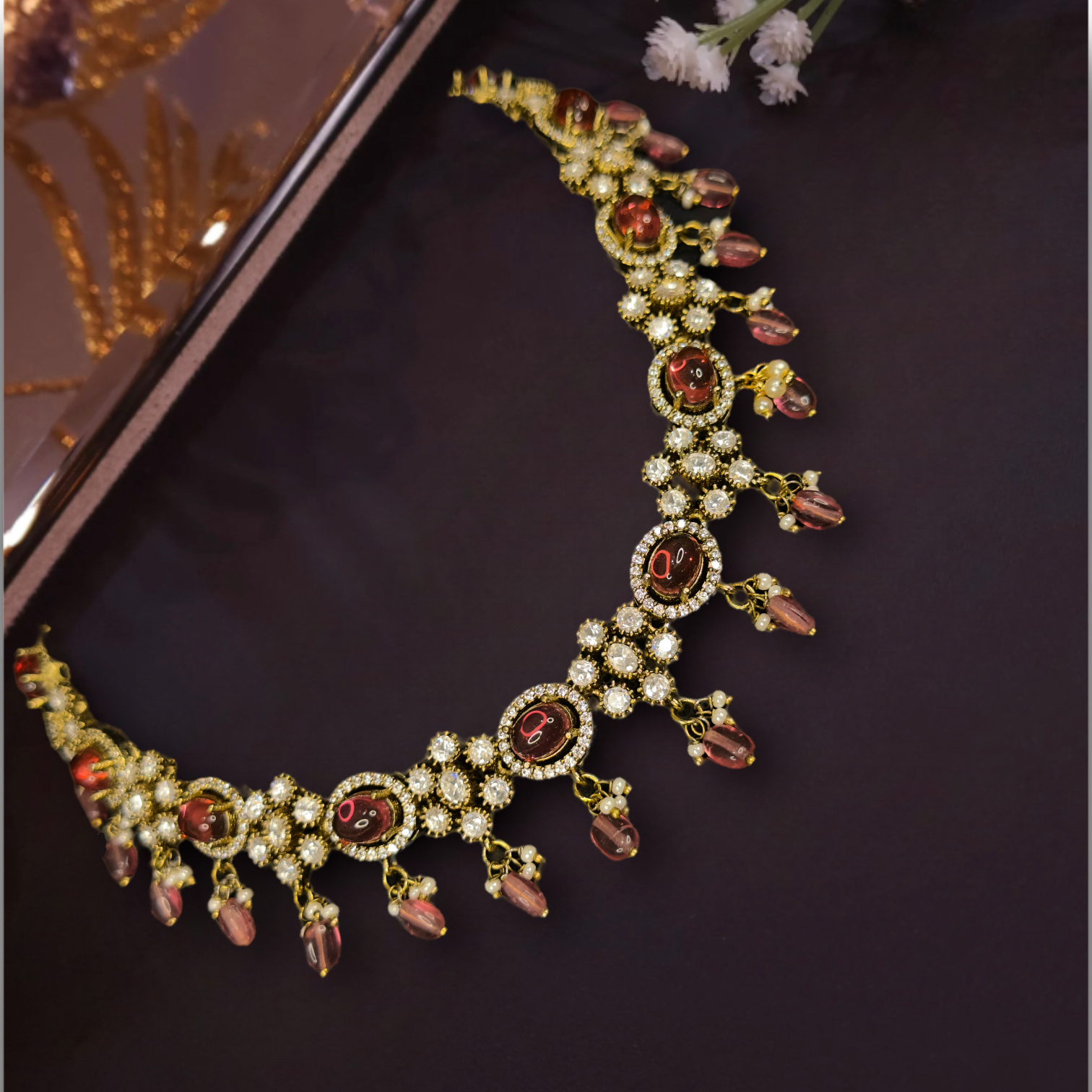 Beautiful Victorian Necklace Set with zircon,moissanite polki stones,pearls, and beads. This Victorian Jewellery is available in Red & Green colour variants. 