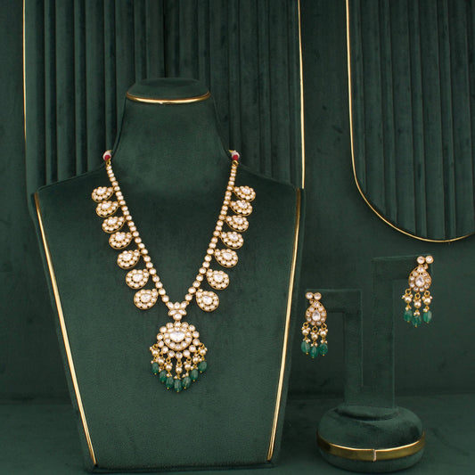 Polki Necklace Set With Green Beads And Matching Earrings