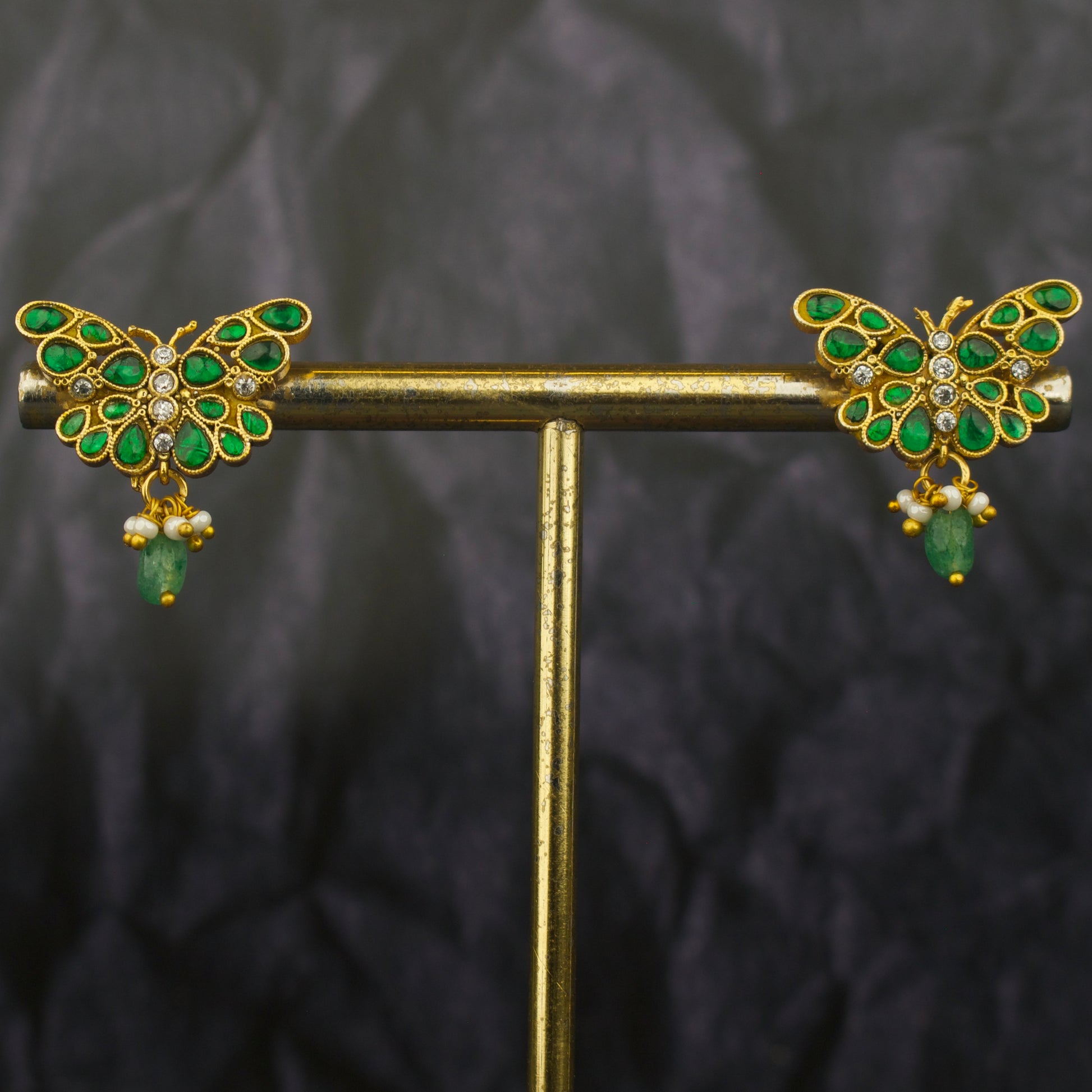 Side view of premium Designer Jadau Kundan Butterfly Design Studs showcasing handcrafted detailing