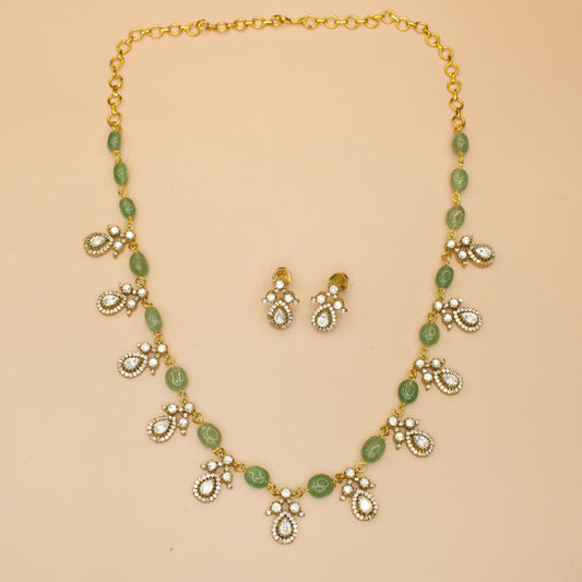 Simple Victorian Beads Necklace with Polki stones. Available in green & purple colour variant. This product comes under Victorian Jewellery category.