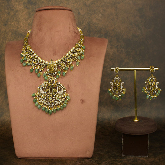 Antique Victorian Necklace Set with zircon, moissanite polki stones, pearls, and beads, including matching earrings. This Victorian Jewellery is available in a Green colour variant. 