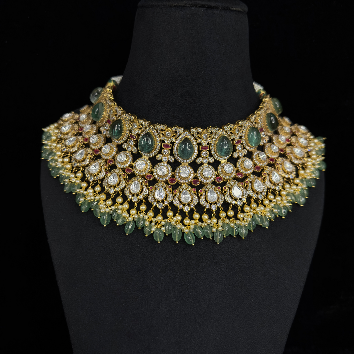 Moissanite Victorian Choker Set with maang tikka, zircon, moissanite polki stones, pearls, and beads, including matching earrings. This Victorian Jewellery is available in Mint,Green & Pink colour variants.
