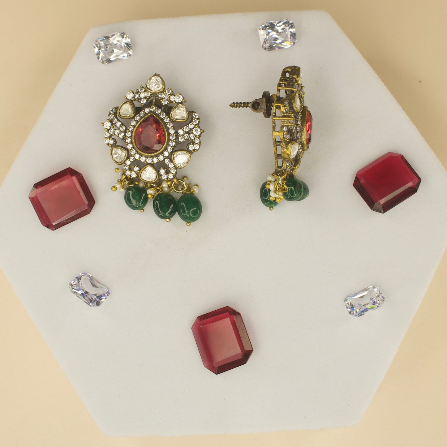 Polki studded Victorian plated studs with high quality victorian finish. available in ruby and green