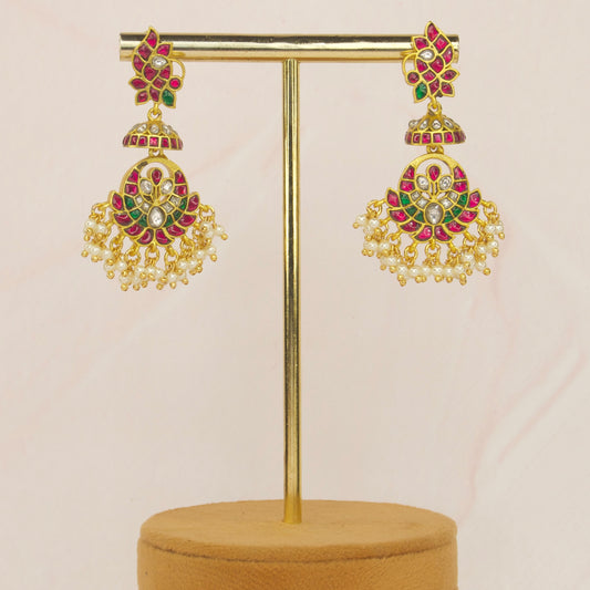 Pristine Jadau Kundan Chandbali Earrings with Pearls with 22k gold plating. This Product belongs to Jadau Kundan jewellery Category
