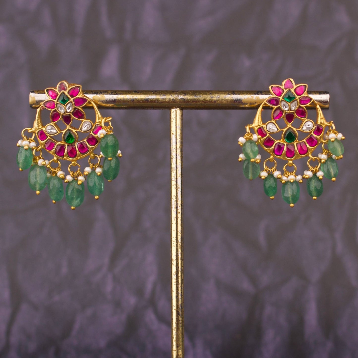 Elite Jadau Kundan Jhumka Earrings With Green Bead Hangings