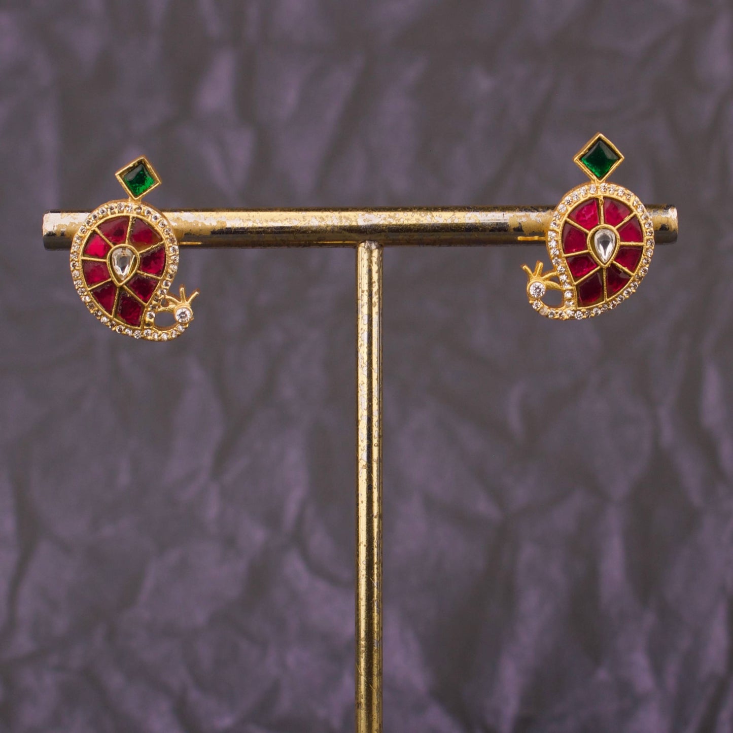 Paisley Design Jadau Kundan Stud Earrings With Red Stones And Green Drop