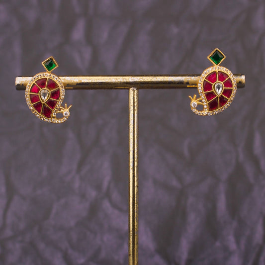 Paisley Design Jadau Kundan Stud Earrings With Red Stones And Green Drop