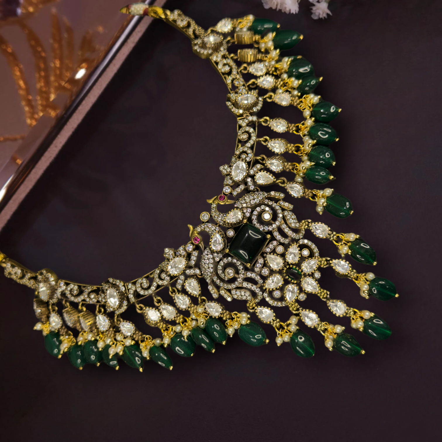Beautiful Victorian Peacock Necklace Set with zircon, peacock motif, moissanite polki stones,pearls, and beads,including matching earrings. This Victorian Jewellery is available in Red,Green & Purple colour variants. 