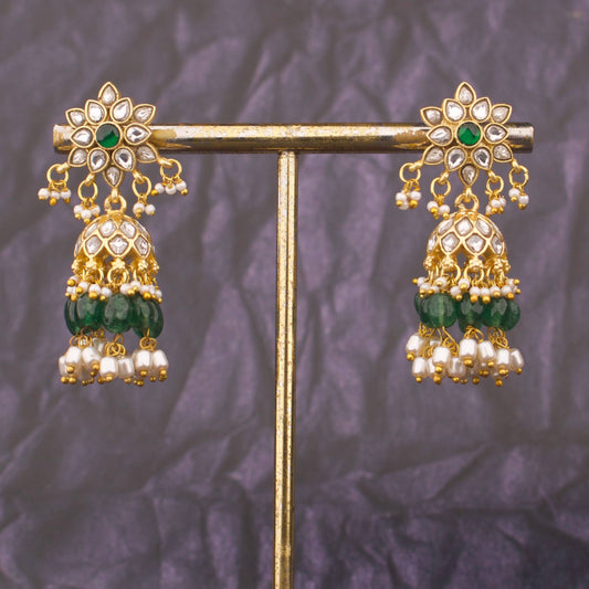 Close-up detailing of Floral Studded Jadau Kundan Jhumki With Pearl Hangings