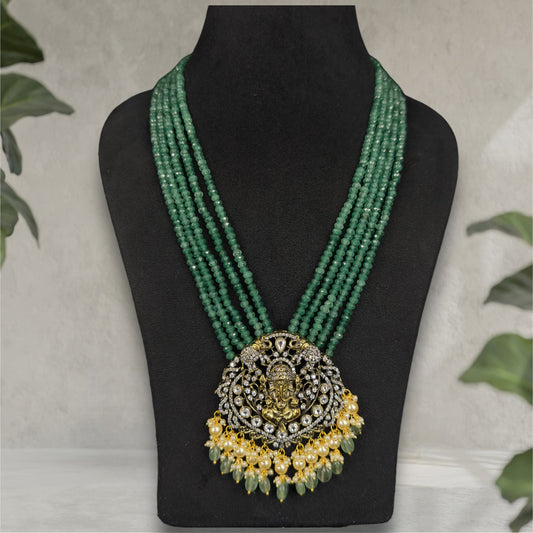 Victorian Beads Mala set with Temple pendant & pearl drops. This Victorian Jewellery is available in a Green colour variant. 