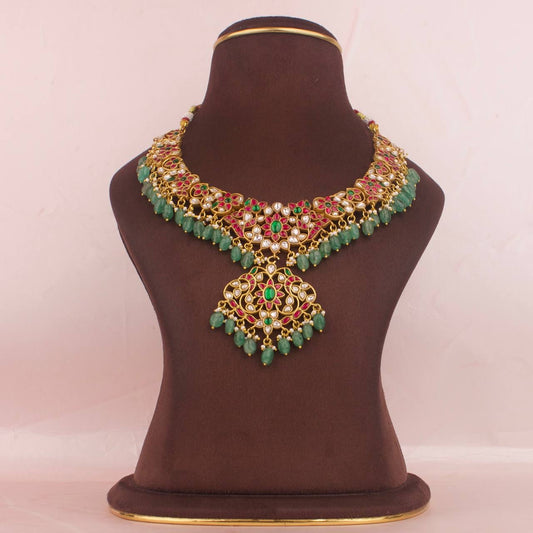 Gold Inspired Jadau Kundan Necklace With Strawberry Beads As Hangings