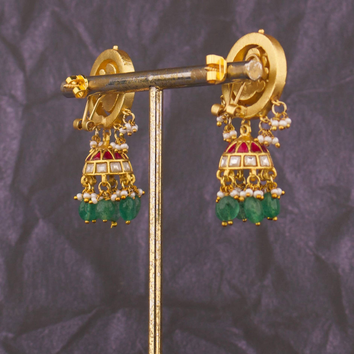 Radiant Jadau Kundan Jhumki Earrings With Emerald Drops Craftsmanship & Detail View - Dulhan Jewels
