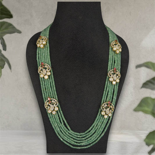 Statement Green Layered Necklace set with Zircon side pendants. This Victorian Jewellery Is available in Ruby & Green colour varaiants. 