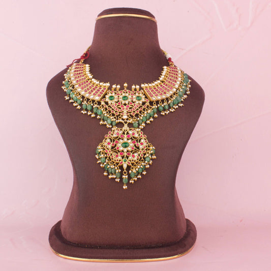 Opulent Jadau Kundan Necklace With Emerald Beads And Statement Locket