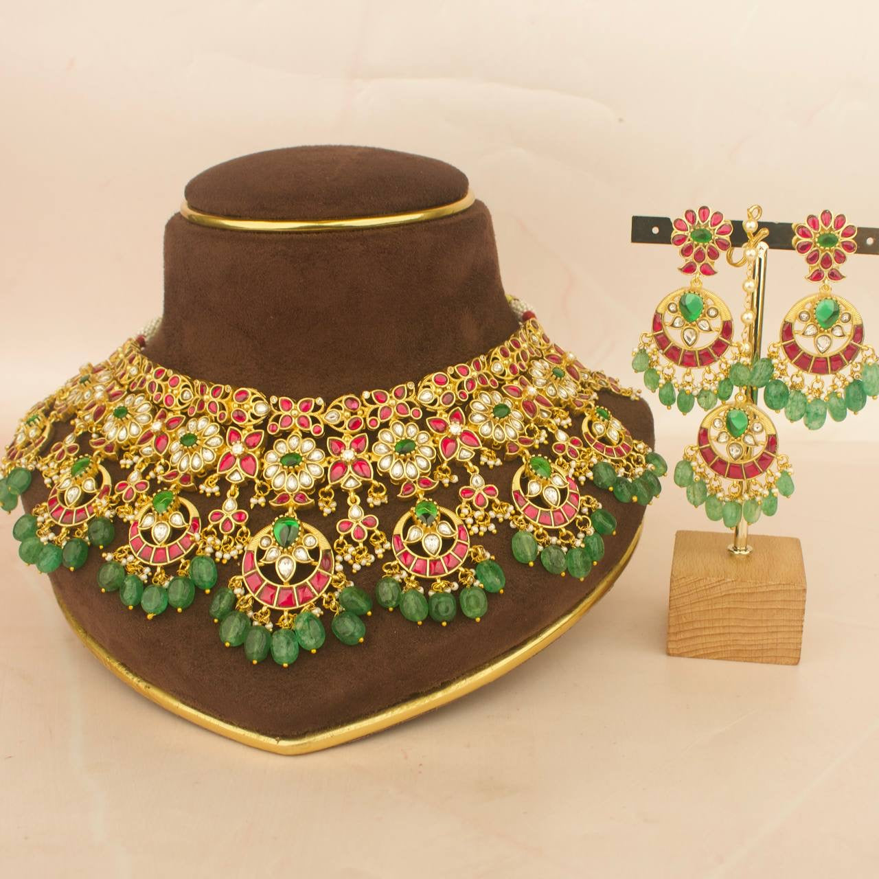 Bridal jadau kundan choker set with matching earrings and maangtika, green beads