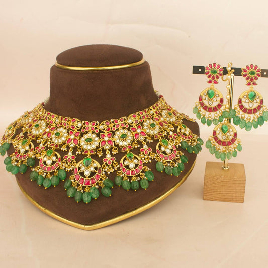 Bridal jadau kundan choker set with matching earrings and maangtika, green beads