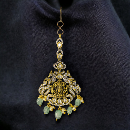 Temple Design Victorian Maang Tikka with Russian Beads. This Victorian jewellery has goddess Laxmi Devi carved on it.