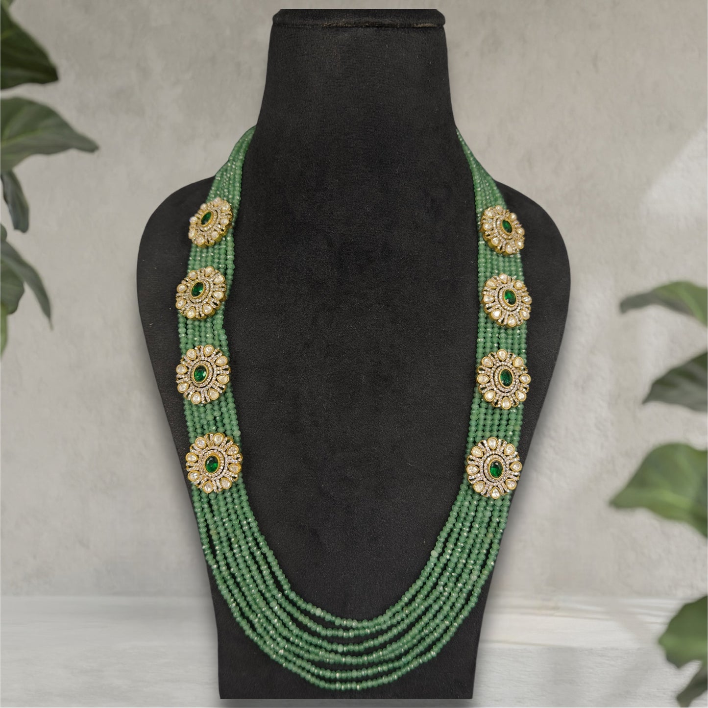 Timeless Green Layered Necklace Set with Zircon Pendants & Earrings. This Victorian Jewellery is available in Red,Green & Purple colour variants. 