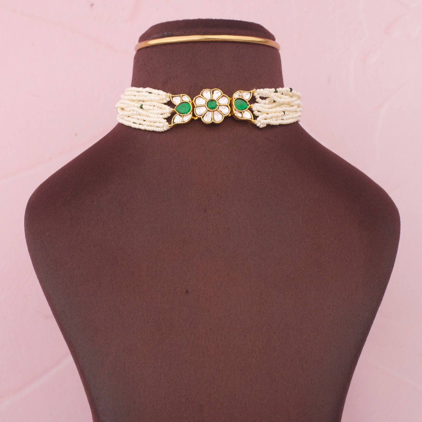 Multi-Strand Pearl Choker With Floral Polki Center And Emerald Stones