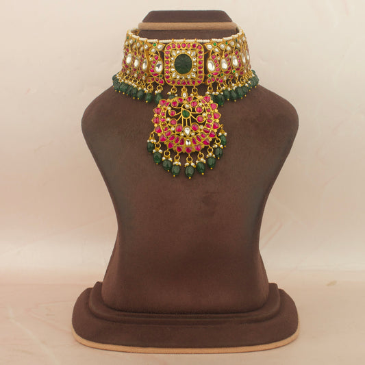 Traditional Indian bridal jadau kundan choker with gold-tone and pink and green stones