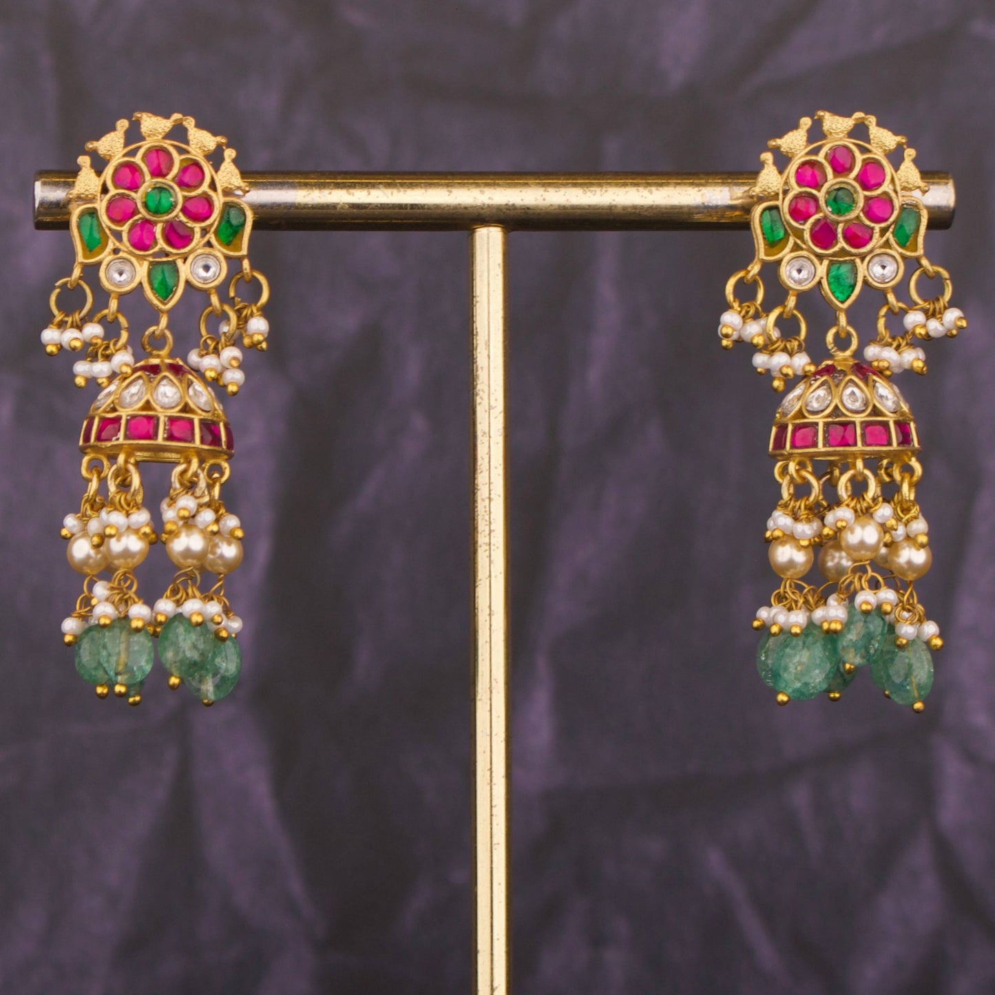 Impressive Floral Design Studded Jadau Kundan Jhumki with Orange beads