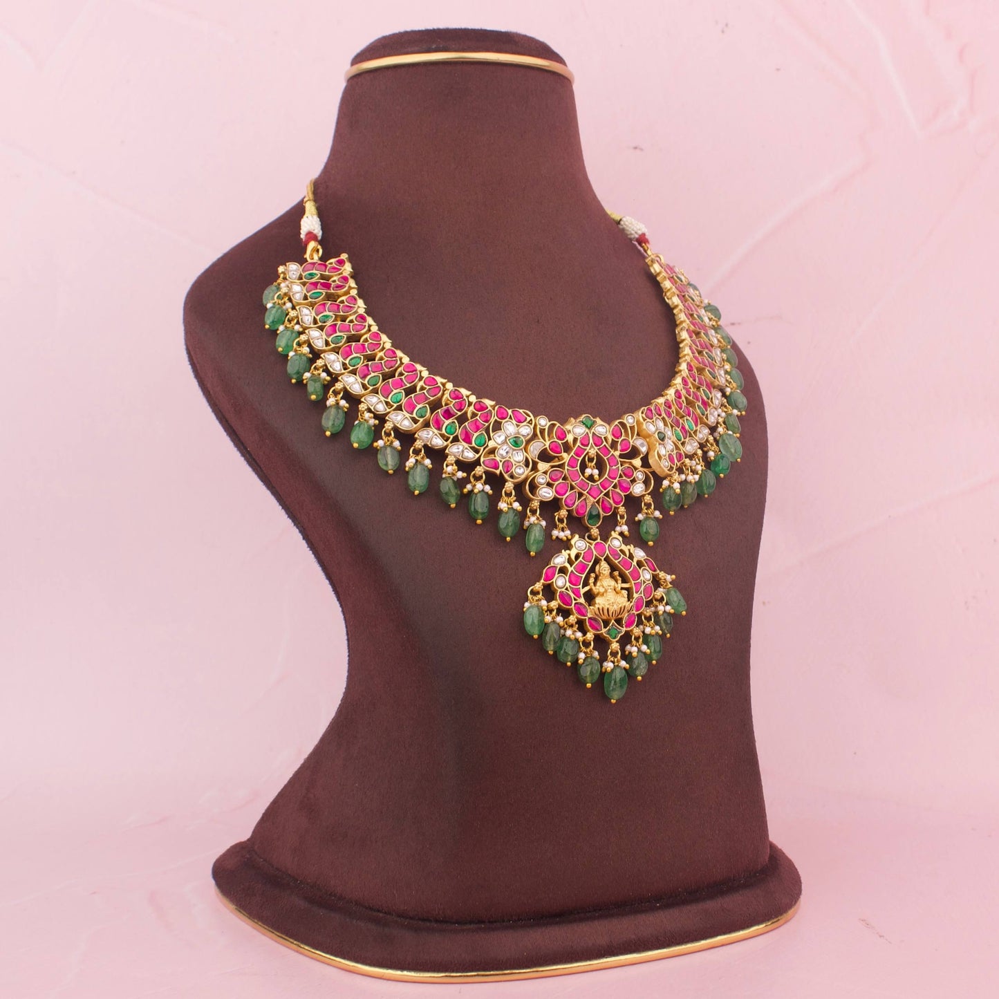 Unique Jadau Kundan Necklace With Goddess Laxmi Pendant And Green Beads