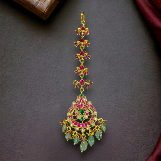 Radiant Jadau Kundan Maang Tikka with Intricate Ruby & Emerald Design