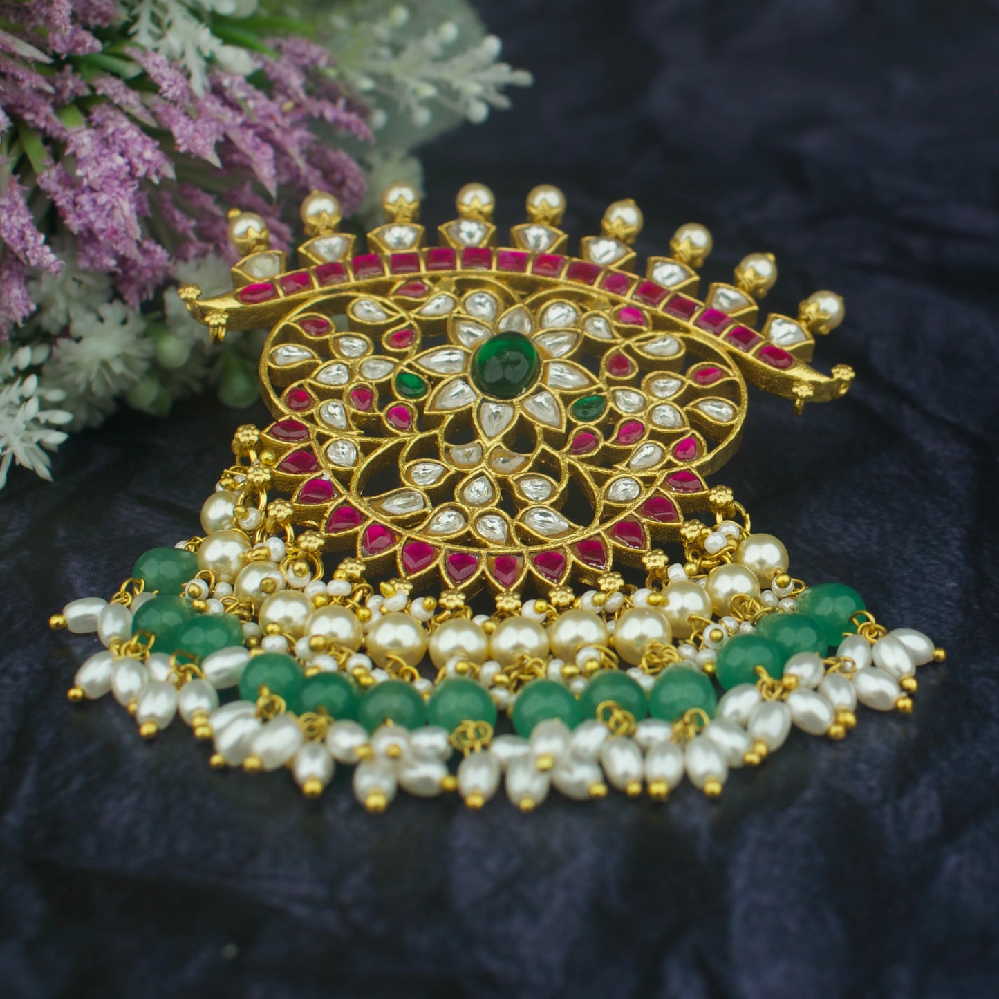 Jadau kundan locket with guttapusalu hangings, gold with green and white stones