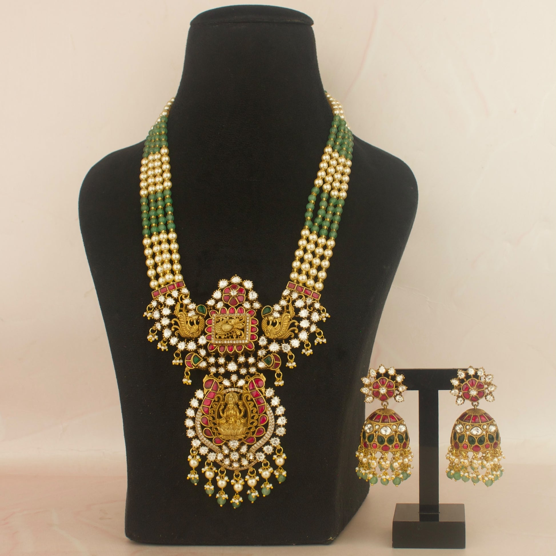 Divine Lakshmi Devi nakshi jadau necklace set with green beads and earrings